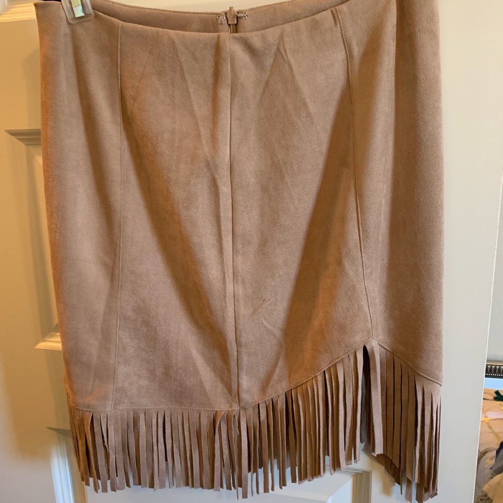 Asymmetrical tan suede skirt from these three boutique